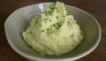 Puré de papas + aceite de trufas negras